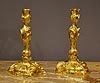 A pair of rare Louis XV gilt bronze candlesticks